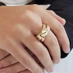 Photo of worn Yellow Gold, Rose White three band ring
