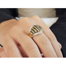 Photo of worn Ring with Dark Green Zircons in Yellow and White Gold