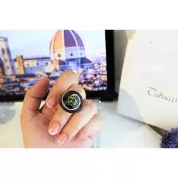 Photo of worn Black Dome Ring Peridot Green Rose Gold