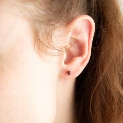 Photo of worn Red Zircon Light Point Earrings 4mm