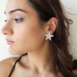 Photo of worn Earrings Sea Star Diamonds 3cm