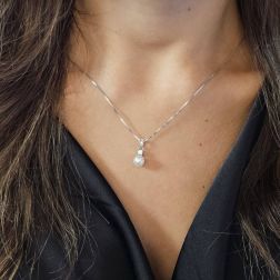 Photo of worn Freshwater pearl and zircon pendant