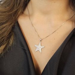 Photo of worn Star pendant with zircons in 18kt White Gold