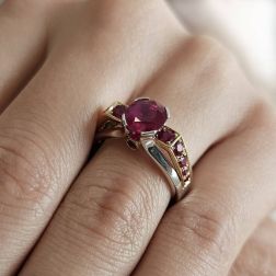 Photo of worn Rubies Triumph Ring in Yellow and White Gold