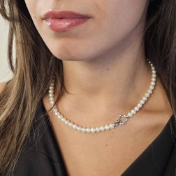 Photo of worn Fresh Water pearls Necklace with 18kt White Gold Flower clasp
