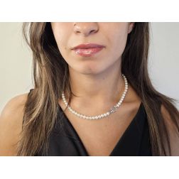 Photo of worn Fresh Water pearls Necklace with 18kt White Gold Flower clasp