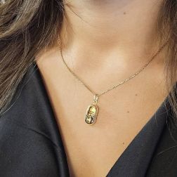 Photo of worn Baby Shoe pendant