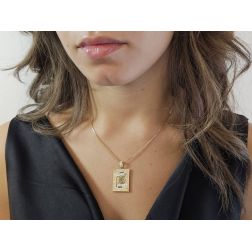 Photo of worn King of spades Card Pendant with enamel and zircons on yellow gold