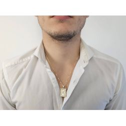 Photo of worn King of spades Card Pendant with enamel and zircons on yellow gold