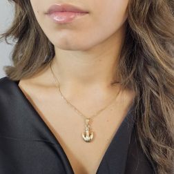 Photo of worn Anchor pendant yellow and white gold