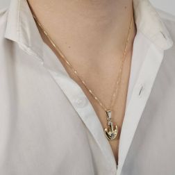 Photo of worn Anchor pendant yellow and white gold
