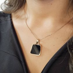 Photo of worn Square pendant Black Onyx with Rose Gold border