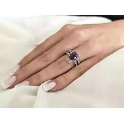 Photo of worn White Gold Solitaire Band Ring with Ruby and Diamonds