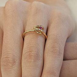 Photo of worn Yellow Gold Ring Ruby Eye and Diamonds
