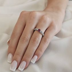 Photo of worn White Gold Solitaire Ruby Ring Surrounded with Diamonds