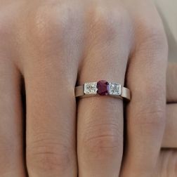 Photo of worn White Gold Squared Solitaire Ring with Ruby and Diamonds
