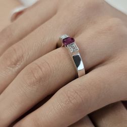 Photo of worn White Gold Squared Solitaire Ring with Ruby and Diamonds