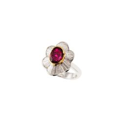 Flower ring with oval ruby and diamonds in White and Yellow Gold