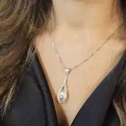 Photo of worn Freshwater pearl drop pendant