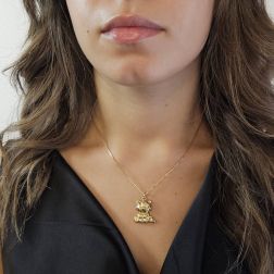 Photo of worn Sitting Cat pendant yellow gold