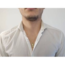 Photo of worn Sitting Cat pendant yellow gold