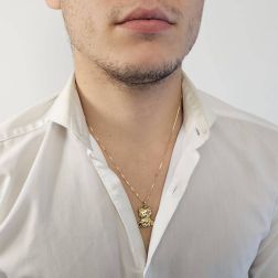 Photo of worn Sitting Cat pendant yellow gold
