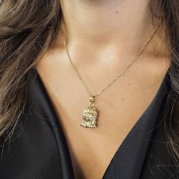 Photo of worn Lion pendant yellow gold