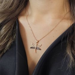 Photo of worn Dragonfly Charm with Black and White zircons in Rose Gold