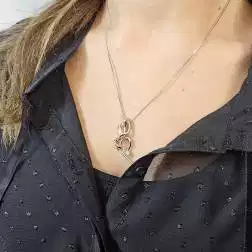 Photo of worn "Passion" Hug Charm with Diamond in two tones color