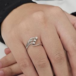 Photo of worn Trilogy ring in white gold and three-row Diamonds