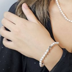 Photo of worn Akoya Pearl Bracelet with lobster clasp with Diamonds in White Gold