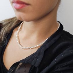 Photo of worn Akoya Pearl Necklace with lobster clasp with Diamonds in White Gold