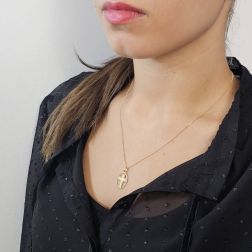Photo worn Golden Cross Pendant in Oval Frame