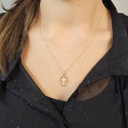 Photo worn Golden Cross Pendant in Oval Frame