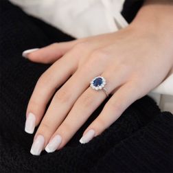 photo of worn White Gold Kate Ring with 9x7mm Sapphire and 12 Diamonds