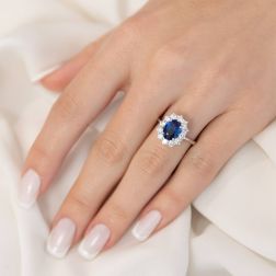 photo of worn White Gold Kate Ring with 9x7mm Sapphire and 12 Diamonds