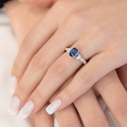 photo of worn Octagonal-cut Sapphire Solitaire Ring with Diamonds