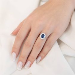 photo of worn 6x8 Blue Sapphire with 12 Diamonds Kate Ring