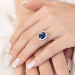 photo of worn White Gold Kate Ring with 11x9mm Sapphire and 18 Diamonds