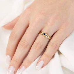 photo of worn Double Band Sapphire Solitaire Ring in Yellow Gold