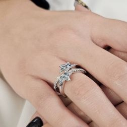 Photo of worn 2 Stars Diamonds and Blue Diamonds Ring in White Gold