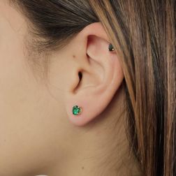 Photo of worn Green Zircon Light Point Earrings 5mm Yellow Gold