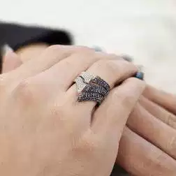 Photo of worn Arrow ring with Blue Sapphires and Diamonds in White 18kt gold