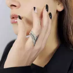 Photo of worn Arrow ring with Blue Sapphires and Diamonds in White 18kt gold