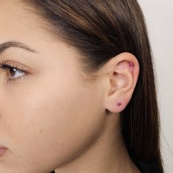 Photo of worn Red Zircon Light Point Earrings 3mm Yellow Gold