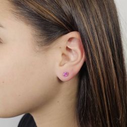 Photo of worn Solitary Studs earrings with Oval 5x4mm Pink Sapphires in white gold
