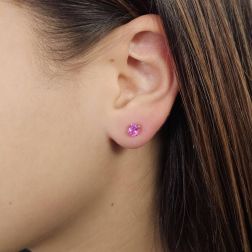 Photo of worn Solitary Studs earrings with Oval 5x4mm Pink Sapphires in white gold