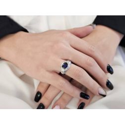 Photo of worn Art Deco band ring with Sapphire and Diamonds in White Gold
