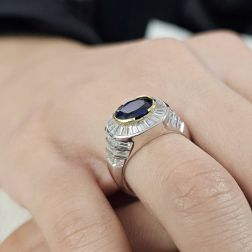 Photo of worn Art Deco band ring with Sapphire and Diamonds in White Gold