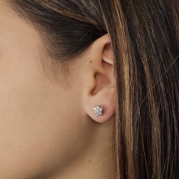 Photo of worn Small Flower Earrings with 14 Diamonds in White Gold